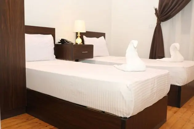Deluxe Tek Büyük veya İki Ayrı Yataklı Oda