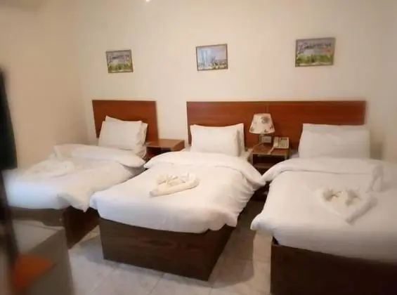 Üç Kişilik Oda