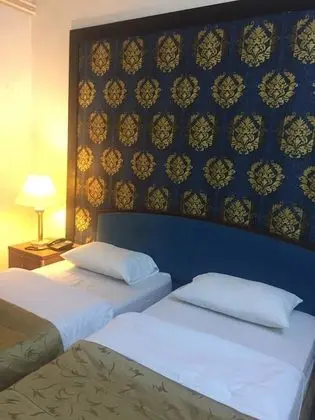 Üç Kişilik Oda