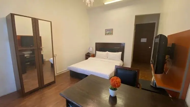 Üç Kişilik Oda