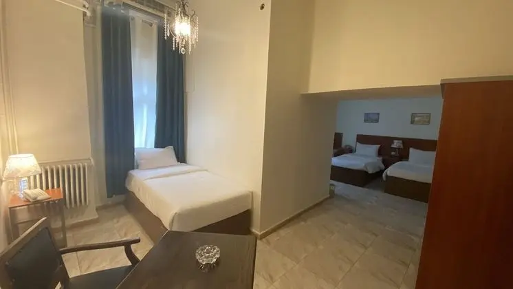 Üç Kişilik Oda