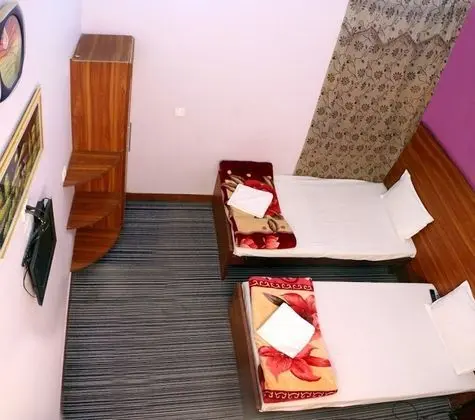 Deluxe Tek Büyük veya İki Ayrı Yataklı Oda