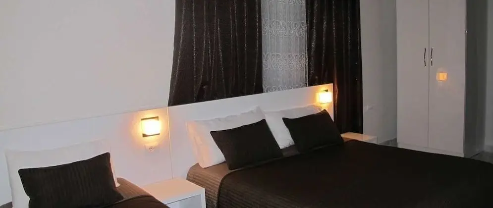 Üç Kişilik Oda