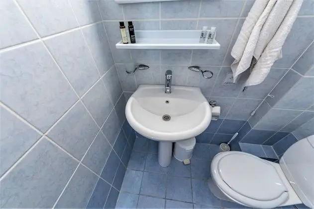 Üç Kişilik Oda