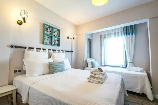 Deluxe Üç Kişilik Oda , Bahçe Manzaralı