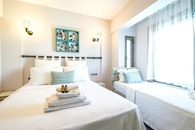Deluxe Üç Kişilik Oda , Bahçe Manzaralı
