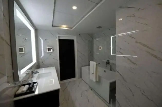 Deluxe Tek Büyük veya İki Ayrı Yataklı Oda