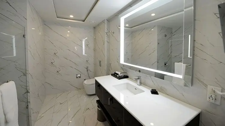 Deluxe Tek Büyük veya İki Ayrı Yataklı Oda