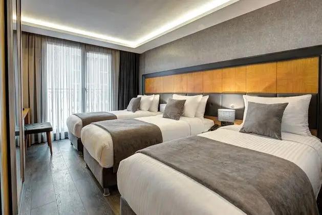 Deluxe Üç Kişilik Oda