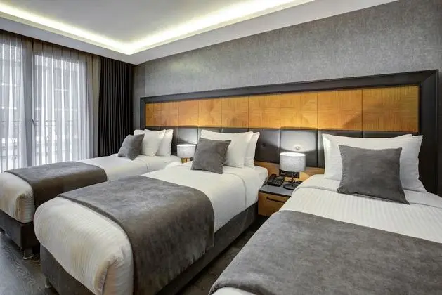 Deluxe Üç Kişilik Oda