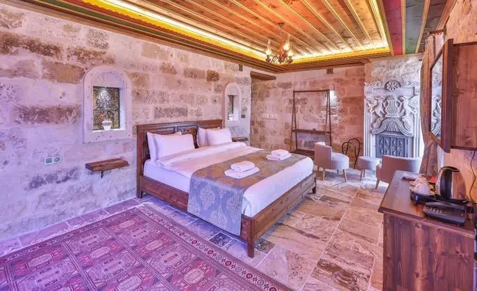 Jakuzili ve Şömineli King Suite Oda, Bahçe Manzaralı, Küvetli veya Jakuzili