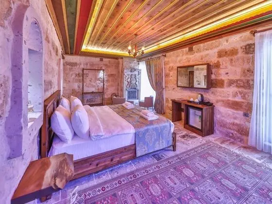Jakuzili ve Şömineli King Suite Oda, Bahçe Manzaralı, Küvetli veya Jakuzili