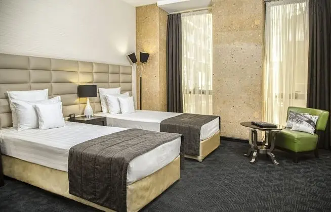 Deluxe Tek Büyük veya İki Ayrı Yataklı Oda