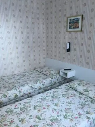Üç Kişilik Oda