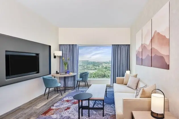 Executive Suite King Bed with Living room Airport View with Cocktail Hours & Short Eats