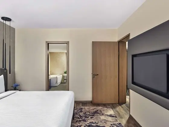Executive Suite King Bed with Living room Airport View with Cocktail Hours & Short Eats