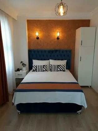 Deluxe Tek Büyük veya İki Ayrı Yataklı Oda