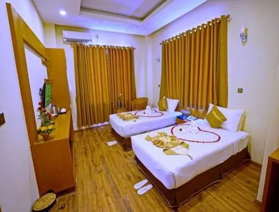 Deluxe Tek Büyük veya İki Ayrı Yataklı Oda