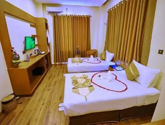 Deluxe Tek Büyük veya İki Ayrı Yataklı Oda