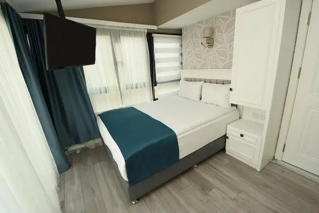 Deluxe Üç Kişilik Oda Balkonlu
