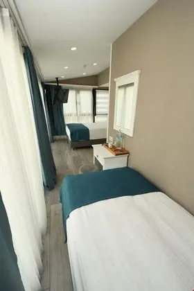 Deluxe Üç Kişilik Oda Balkonlu