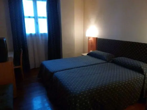 Tek Büyük Yataklı Oda (1 o 2 camas individuales)