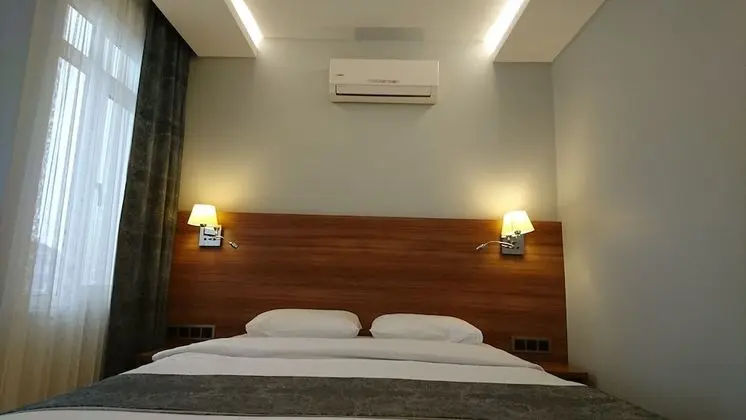 Deluxe Tek Büyük veya İki Ayrı Yataklı Oda