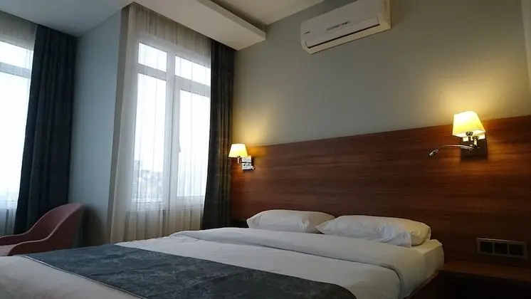 Deluxe Tek Büyük veya İki Ayrı Yataklı Oda