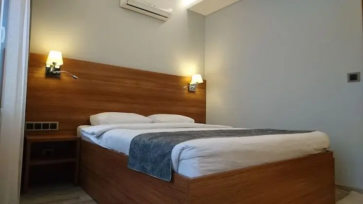Deluxe Tek Büyük veya İki Ayrı Yataklı Oda