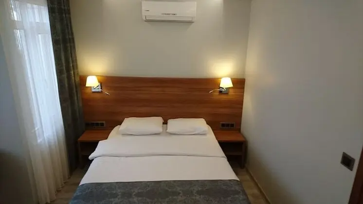 Deluxe Tek Büyük veya İki Ayrı Yataklı Oda