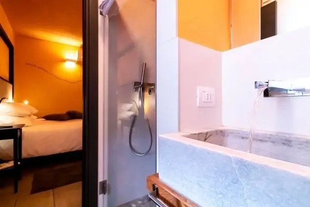 Deluxe Tek Büyük veya İki Ayrı Yataklı Oda, Şömine, Avlu Manzaralı