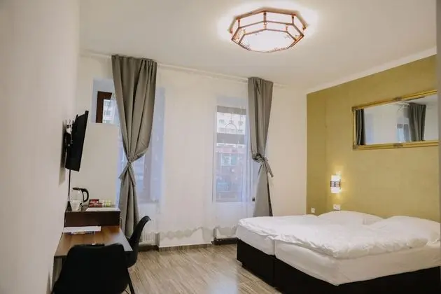 Deluxe Tek Büyük veya İki Ayrı Yataklı Oda