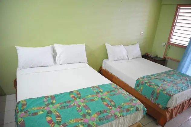 Standard with a Queen bed or 2 double beds, with Fan