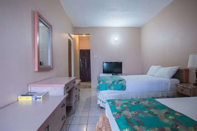Standard with a Queen bed or 2 double beds, with Fan