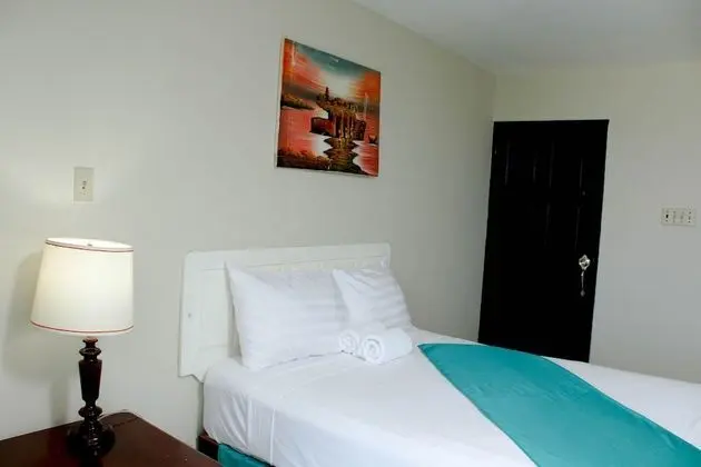 Standard with a Queen bed or 2 double beds, with Fan