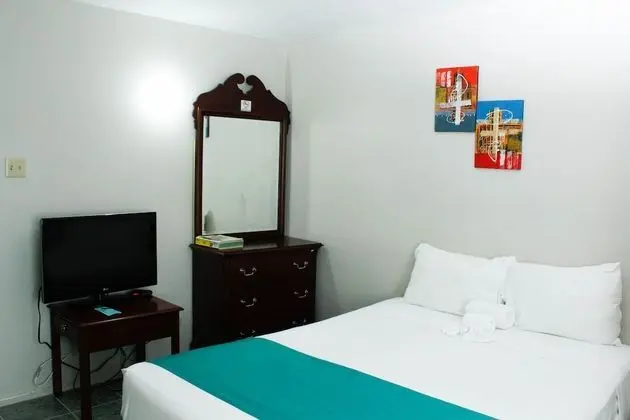 Standard with a Queen bed or 2 double beds, with Fan