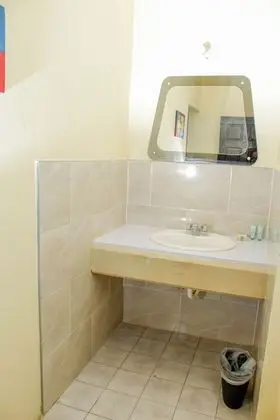 Standard with a Queen bed or 2 double beds, with Fan