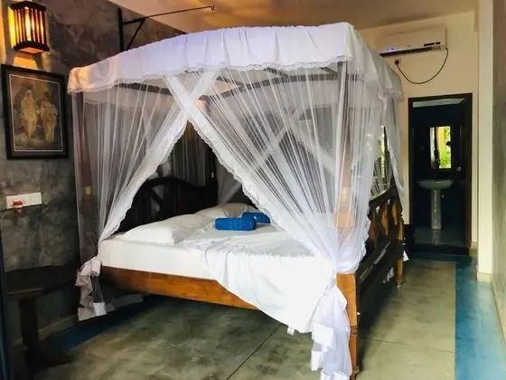 Deluxe Tek Büyük veya İki Ayrı Yataklı Oda, Veranda
