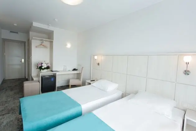 Comfort Tek Büyük veya İki Ayrı Yataklı Oda