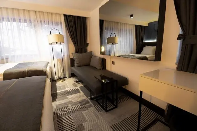 Deluxe Üç Kişilik Oda, Birden Çok Yatak