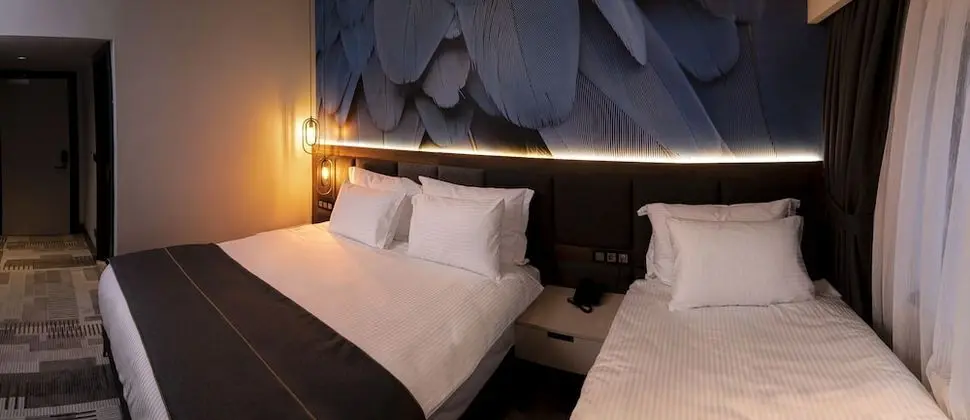 Deluxe Üç Kişilik Oda, Birden Çok Yatak