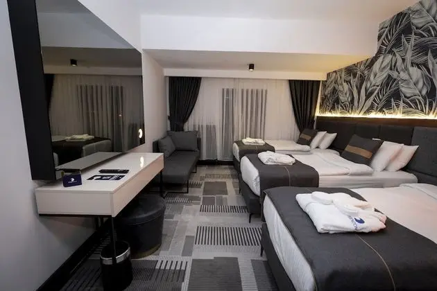 Deluxe Üç Kişilik Oda, Birden Çok Yatak