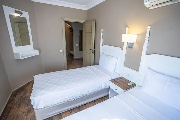 https://images.etstur.com/files/images/hotelImages/TR/50622/l/Olbios-Marina-Resort-Hotel-Oda-392204.jpg