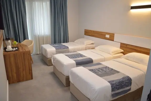 Deluxe Üç Kişilik Oda