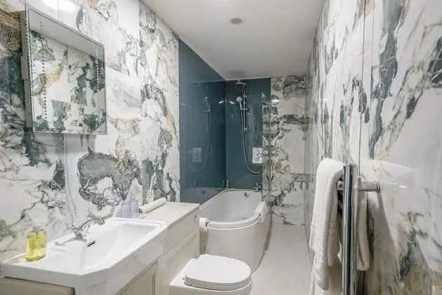 Deluxe Tek Büyük Yataklı Oda, Banyolu/Duşlu