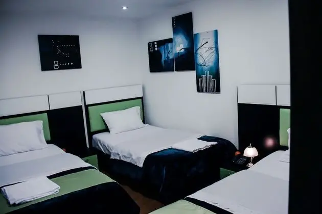 Deluxe Üç Kişilik Oda, 3 Tek Kişilik Yatak
