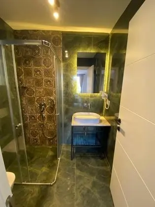Deluxe Oda, Bahçe veya Sokak Manzaralı, Balkonlu