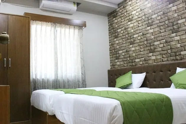 Deluxe Tek Büyük veya İki Ayrı Yataklı Oda
