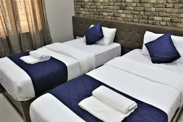 Deluxe Tek Büyük veya İki Ayrı Yataklı Oda