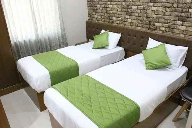 Deluxe Tek Büyük veya İki Ayrı Yataklı Oda